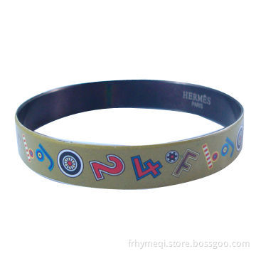 Stainless steel bangle with stoving varnish